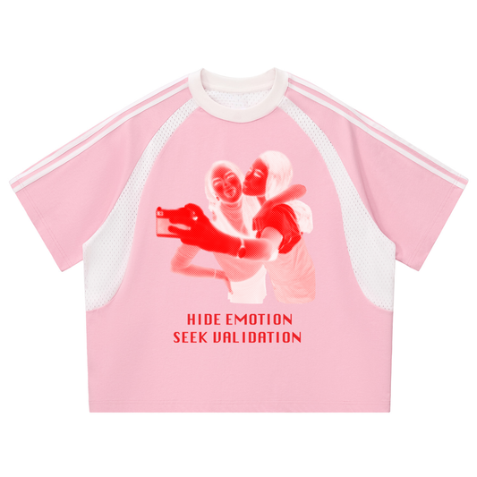 Pink t-shirt with an image of two girls taking selfie and text on a pink background