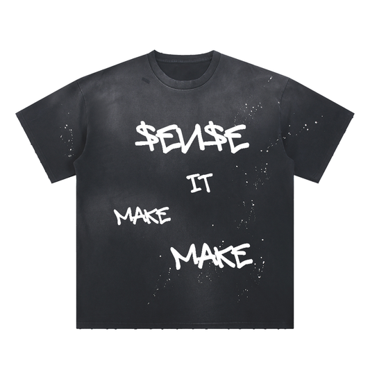 Black t-shirt with paint splatter and distressed edgy look with white text
